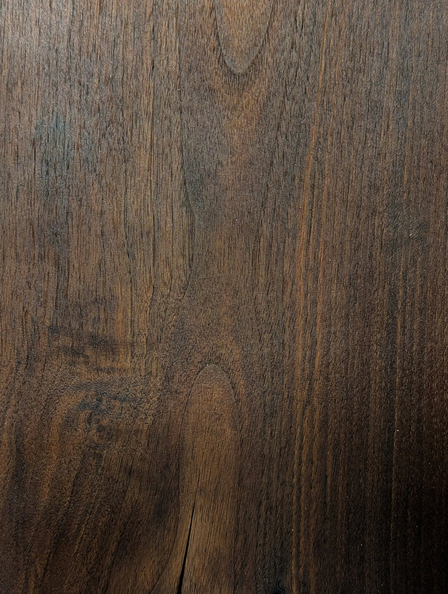 Dark walnut wood swatch — locally sourced from New Mexico and Oklahoma